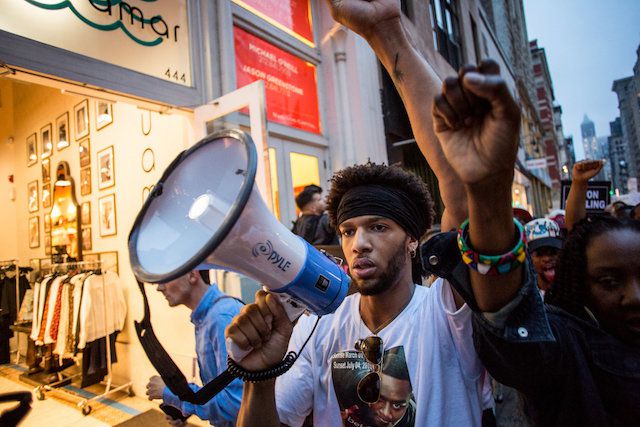 Delrawn Small's newphew Zayanahla Vines, 22, leads a march of protesters through Manhattan six days after Small was shot and killed by off-duty NYPD officer Wayne Isaacs.
